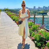 Adorable vestido veraniego midi con abertura alta y estampado de margaritas - Amarillo